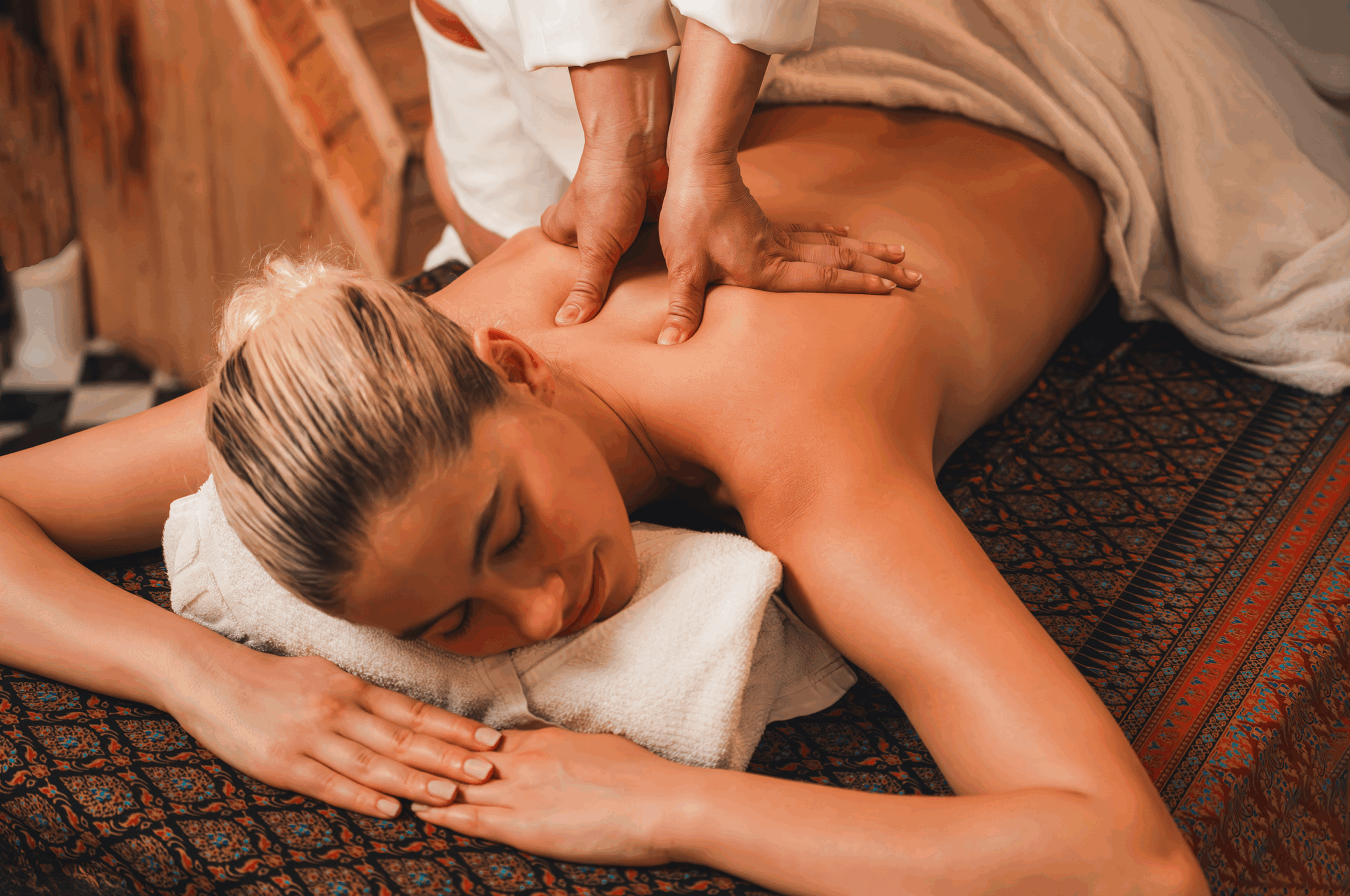 Woman receiving a relaxing back massage.